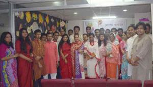 bbarta24.net editor Bani Yesmin Hasi poses with bbarta staff and guests marking Pahela Baishaikh at its office at Kawran Bazar in the capital on Thursday.